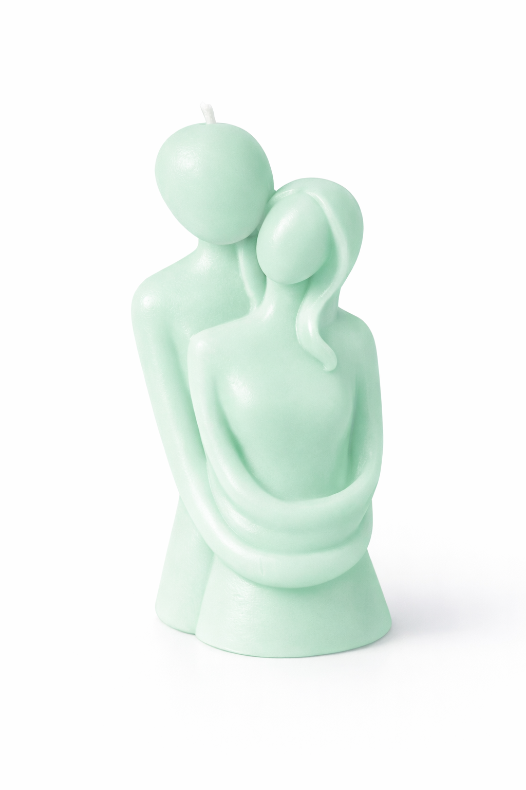 Vela romántica en tono verde esmeralda suave con figura abstracta de pareja abrazada, realizada en cera natural de acabado satinado, diseño minimalista contemporáneo ideal para decoración elegante, boda o detalle especial premium.