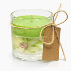 Vela recordatorio de funeral con cera verde y flor natural encapsulada en vidrio, detalle de obsequio conmemorativo artesanal de alta gama.