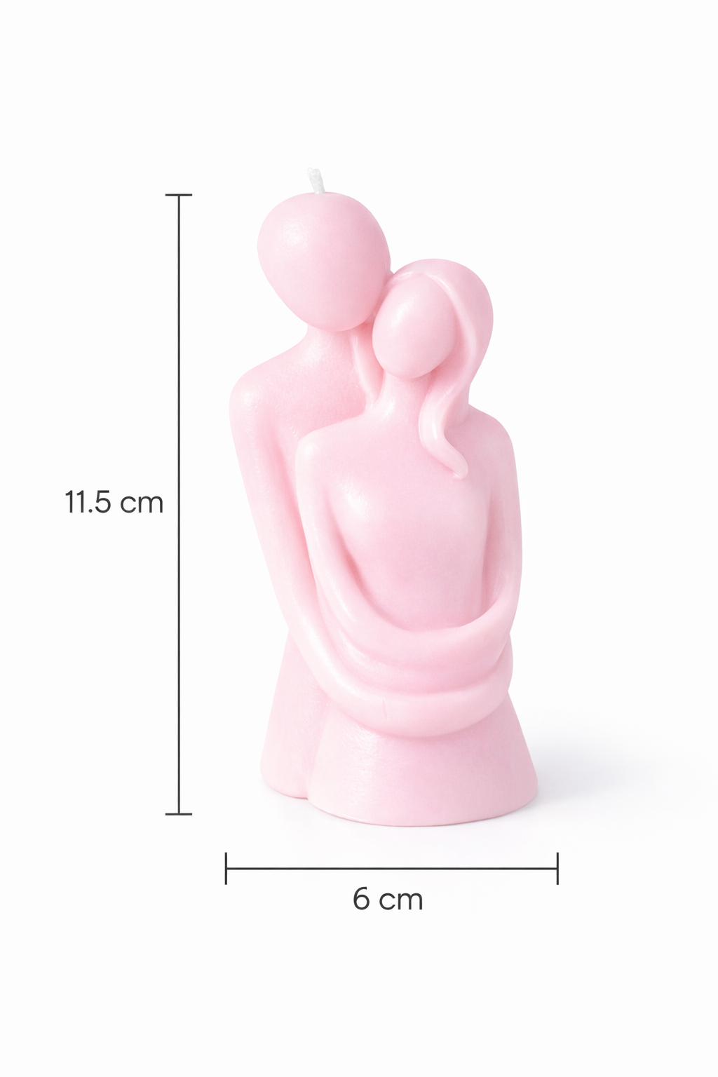 Vela escultórica romántica de 11.5 cm de alto y 6 cm de ancho en color rosa pastel, elaborada en cera natural, diseño moderno de pareja abrazada con líneas minimalistas, pieza decorativa exclusiva para regalo de boda o aniversario.