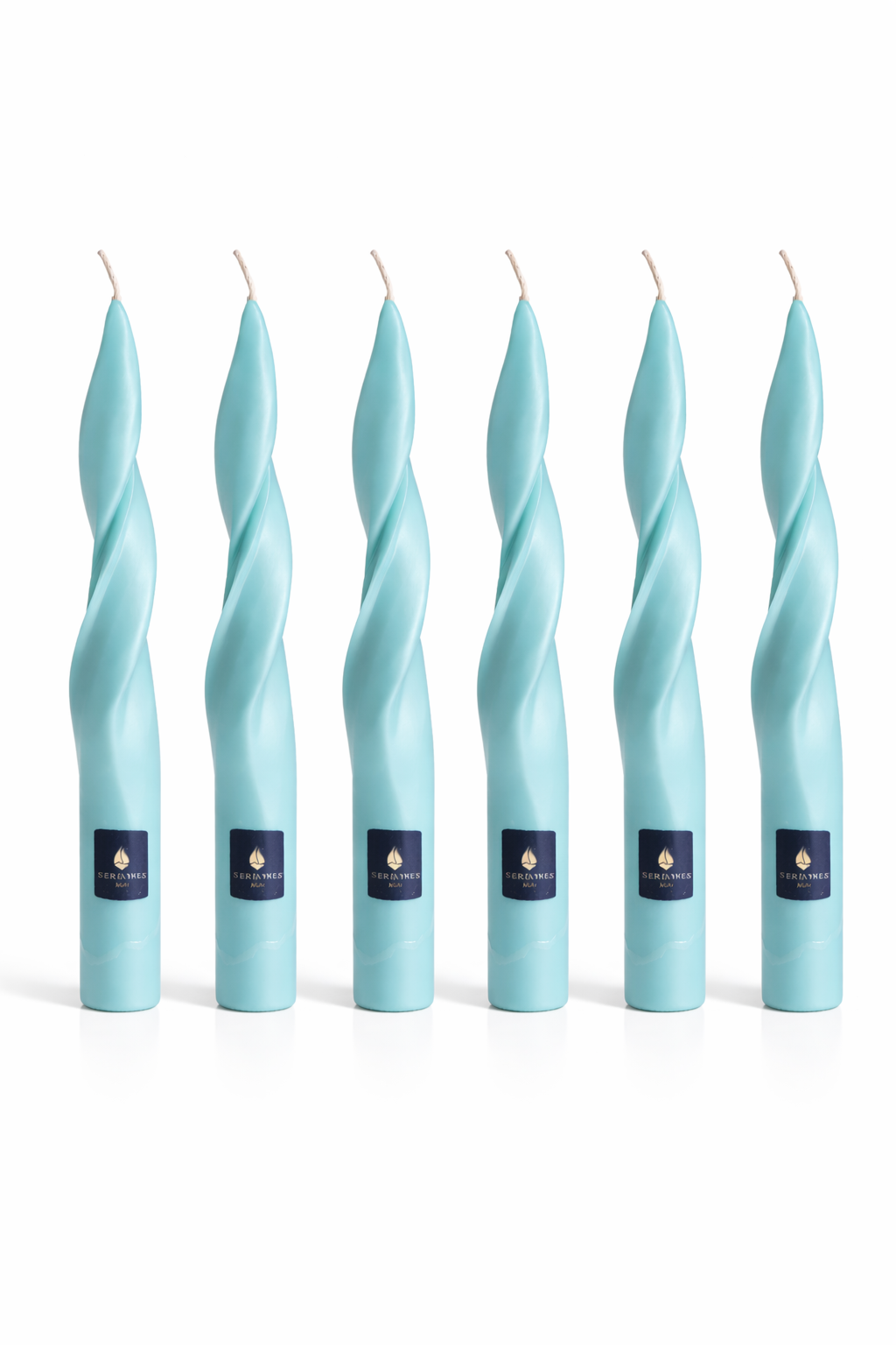 Pack de velas cónicas de autor Aura Atelier ÉCLAT con forma escultórica, elaboradas artesanalmente y disponibles en distintos colores